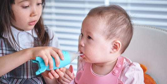 Marcus & Marcus Silicon Baby Feeding Spoon Dispenser.